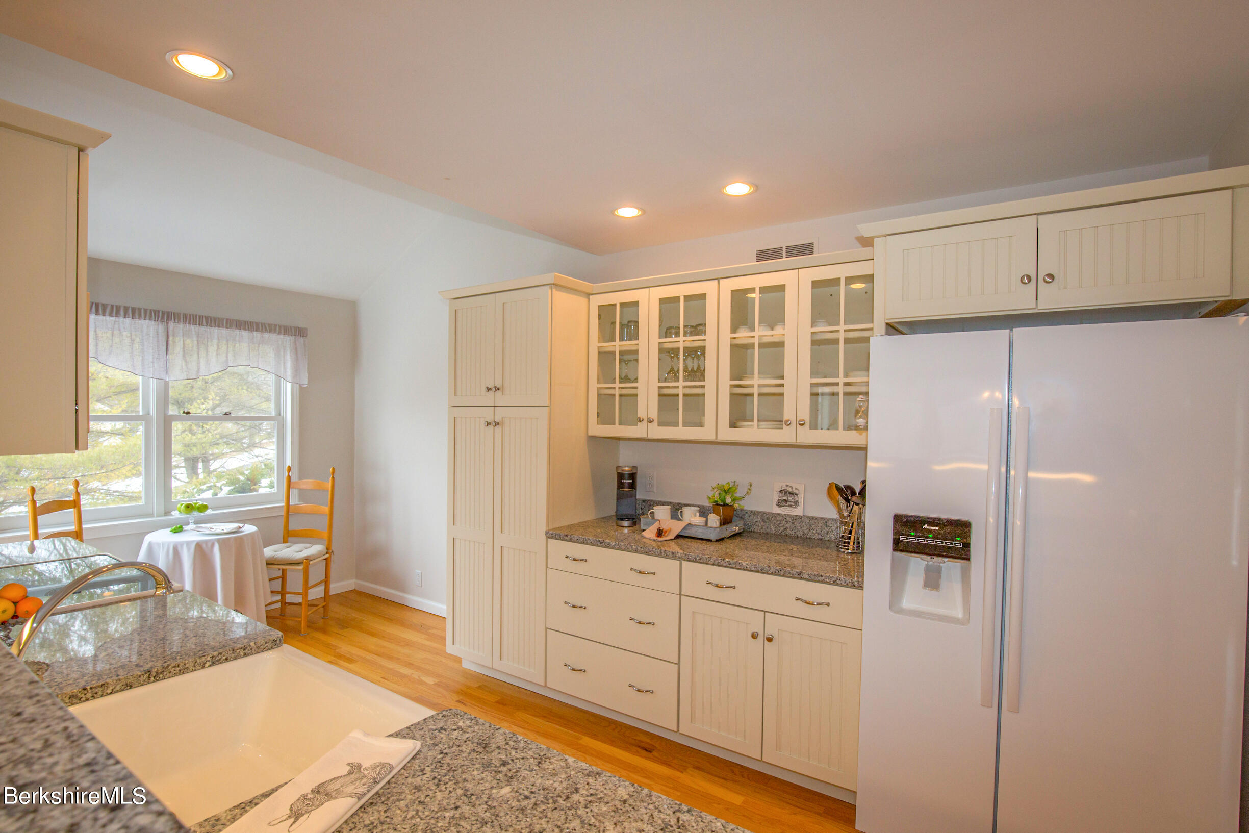 1136 Barker Road, Unit 9 Pittsfield, MA 01201 - Photo 20 of 60 a kitchen with stainless steel appliances granite countertop a refrigerator and a stove top oven