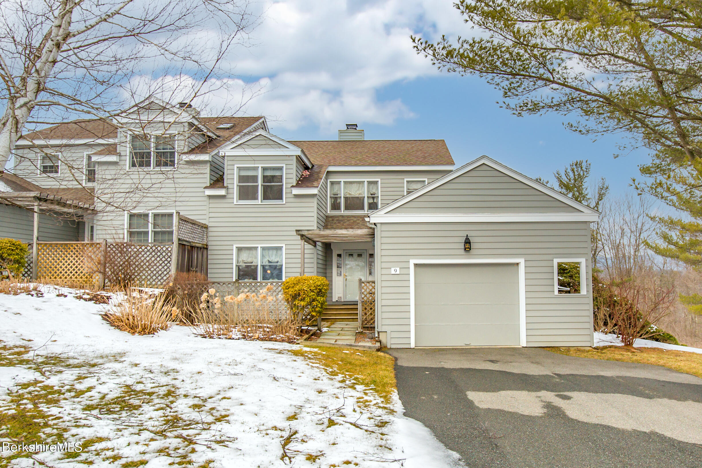 1136 Barker Road, Unit 9 Pittsfield, MA 01201 - Photo 2 of 60 a front view of a house
