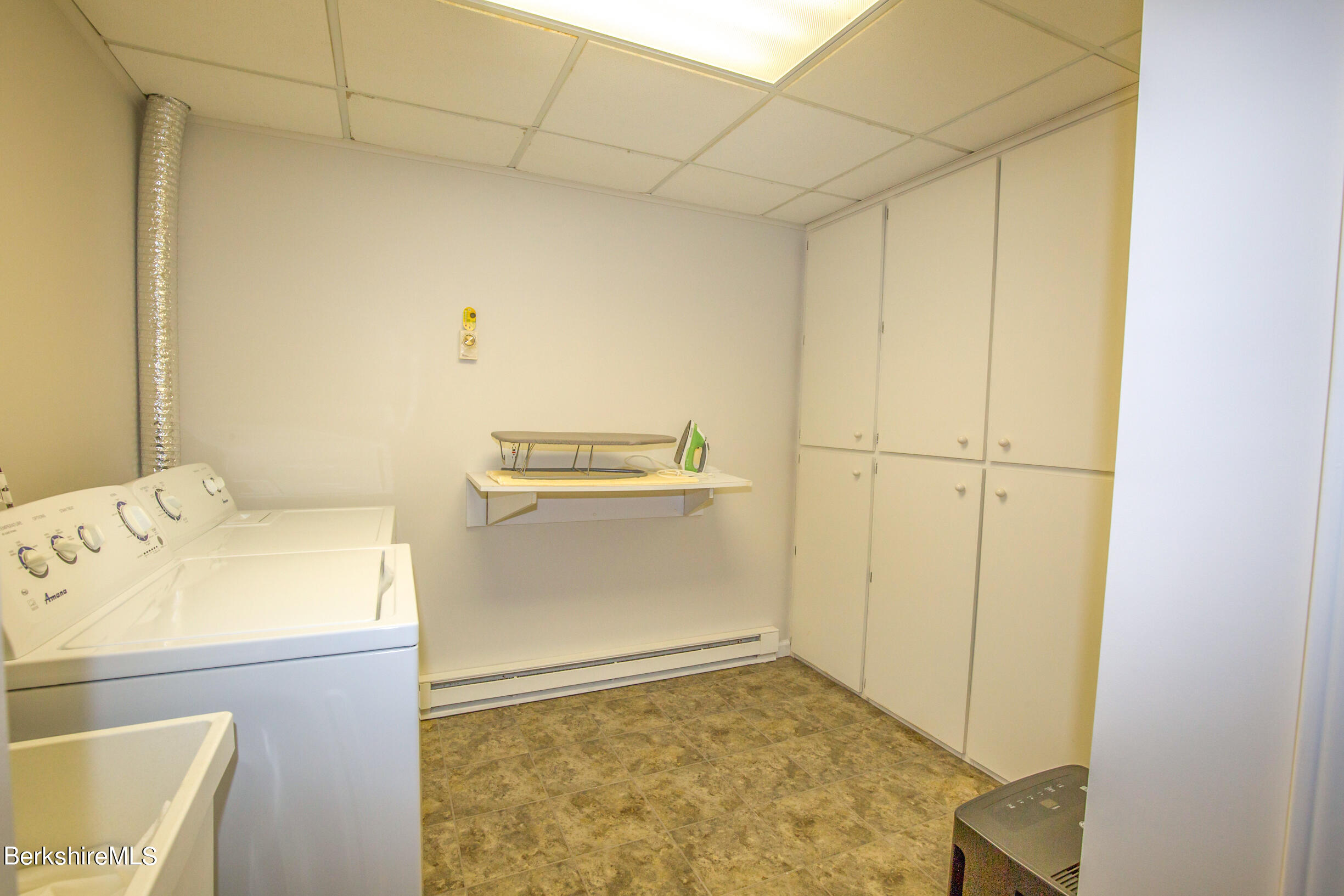 1136 Barker Road, Unit 9 Pittsfield, MA 01201 - Photo 39 of 60 a bathroom with a sink and a shower