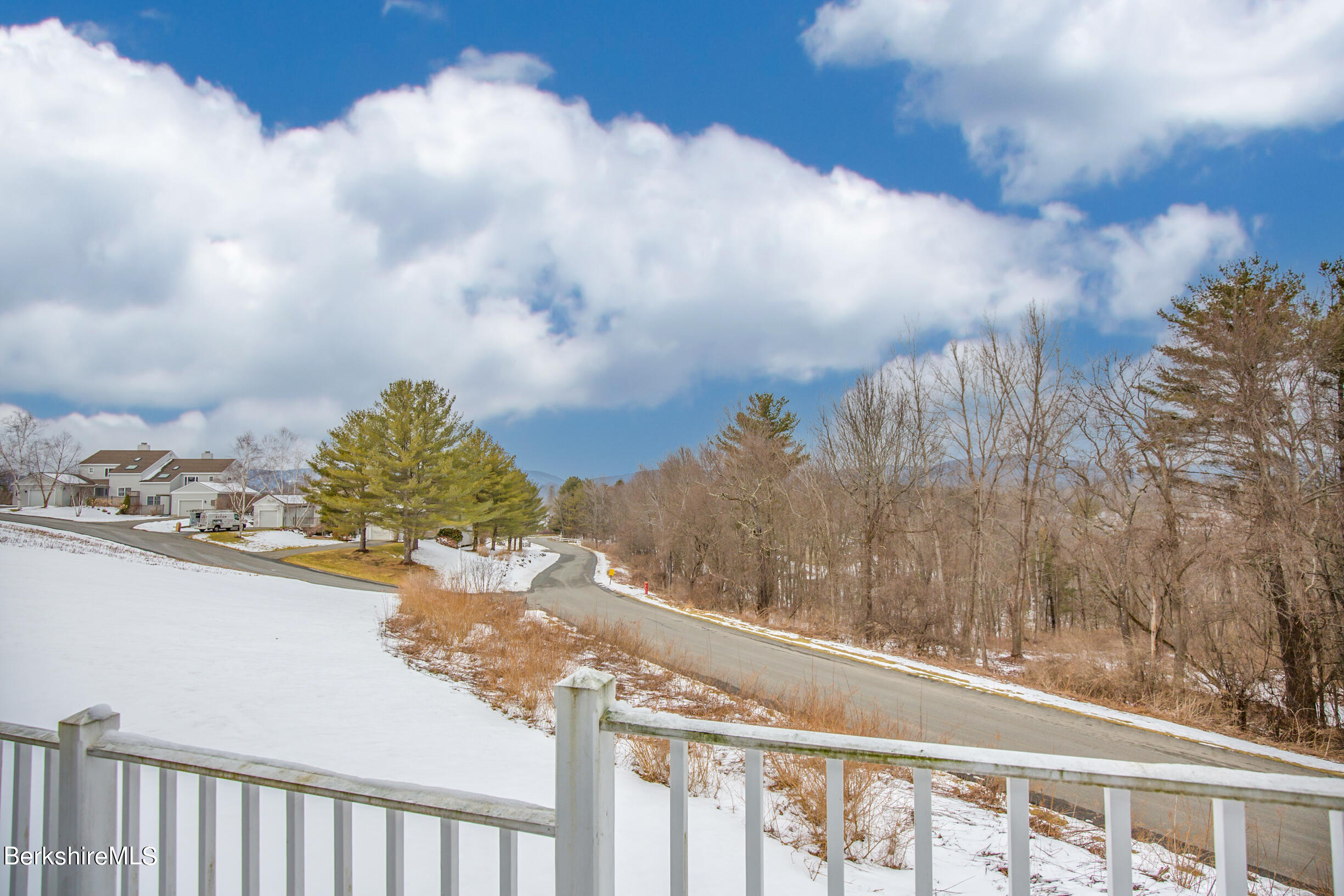 1136 Barker Road, Unit 9 Pittsfield, MA 01201 - Photo 41 of 60 a view of a lake from a balcony