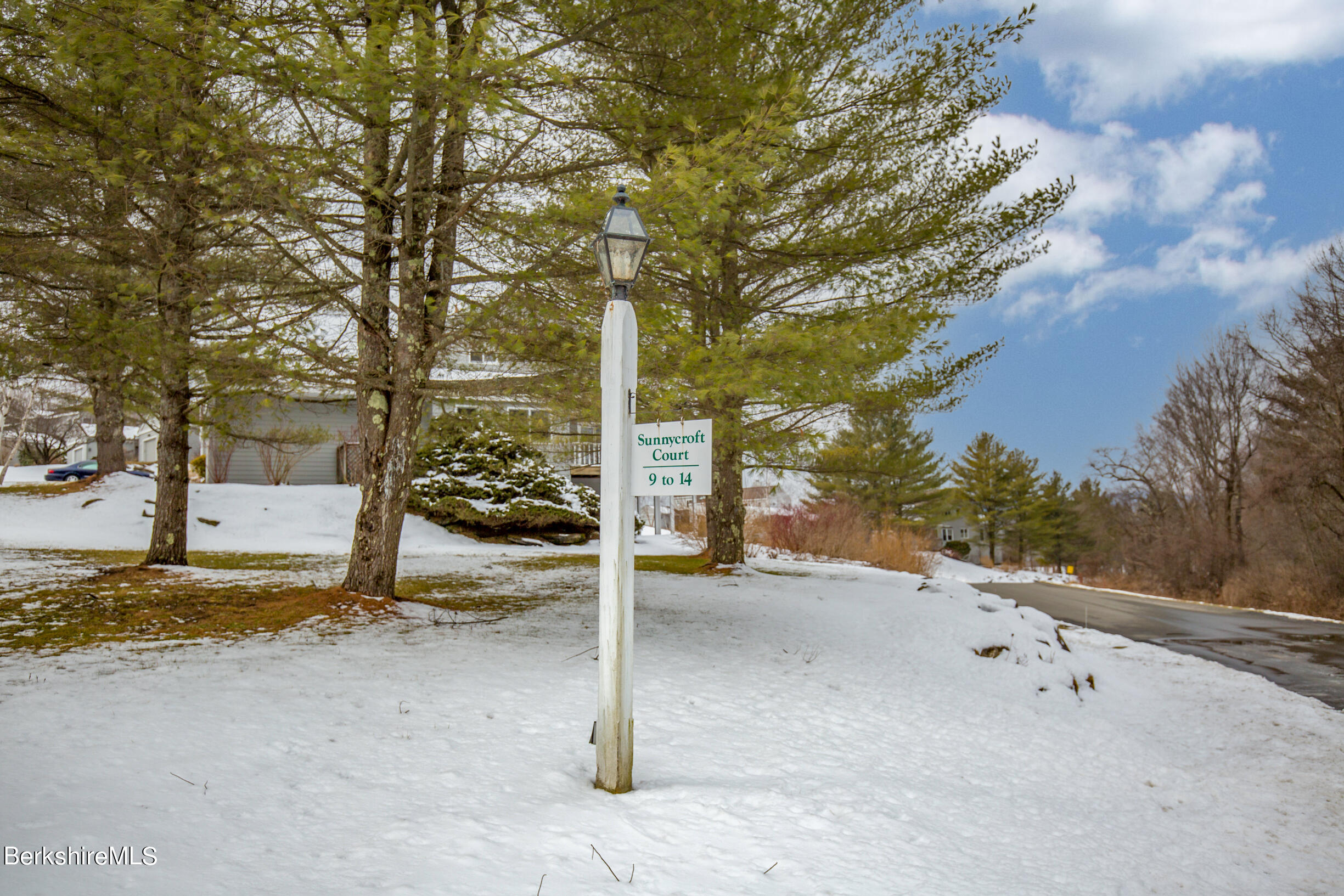 1136 Barker Road, Unit 9 Pittsfield, MA 01201 - Photo 46 of 60 a view of a yard with tree s