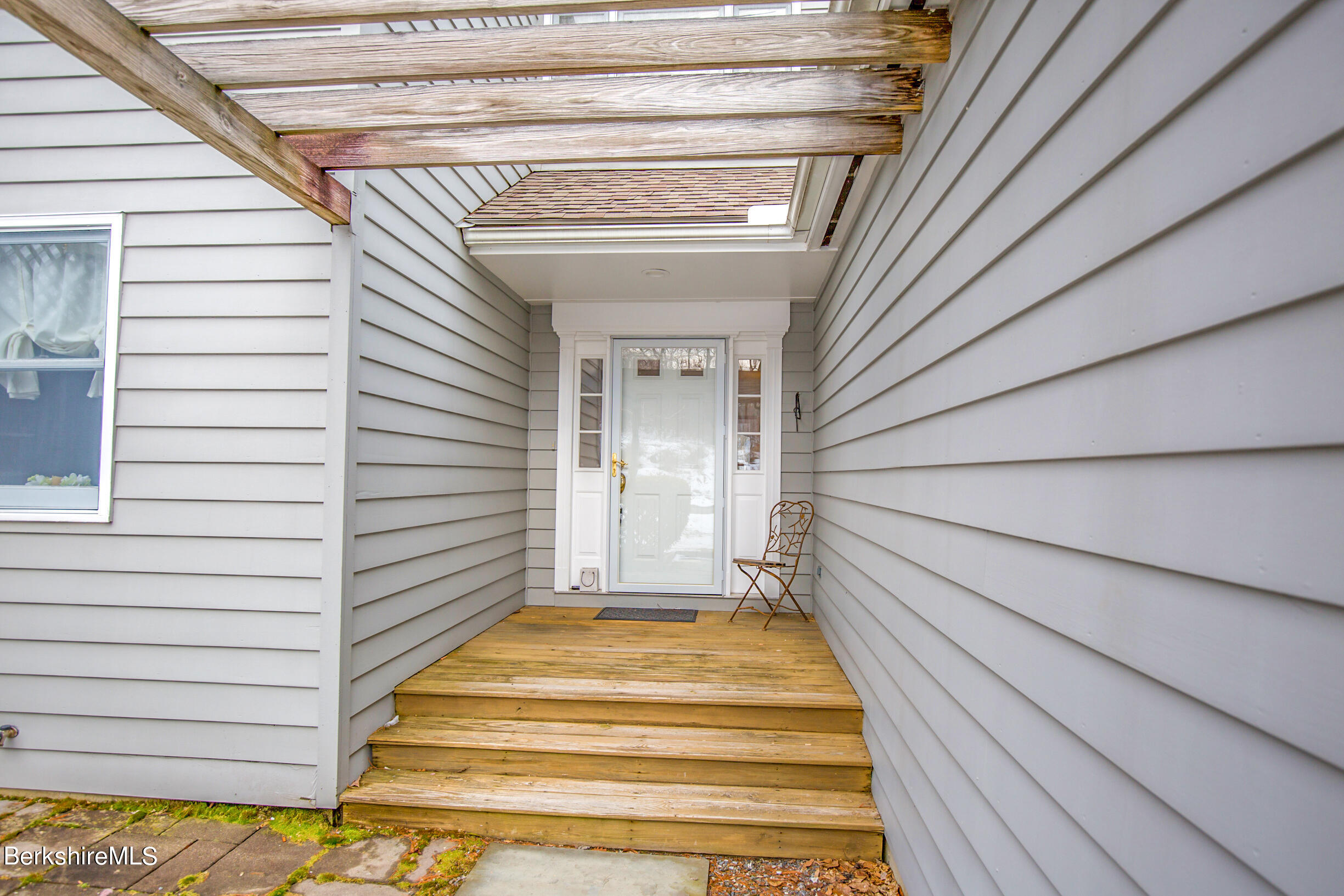 1136 Barker Road, Unit 9 Pittsfield, MA 01201 - Photo 58 of 60 a view of a entryway door of the house