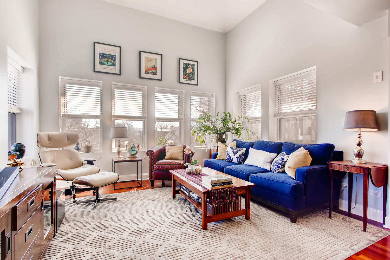 1242 West Pratt Boulevard, Unit 3F Chicago, IL 60626 - Photo 2 of 30 a living room with furniture and a large window