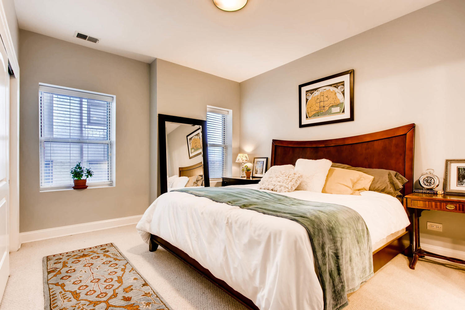 1242 West Pratt Boulevard, Unit 3F Chicago, IL 60626 - Photo 14 of 30 a bedroom with double bed and a window