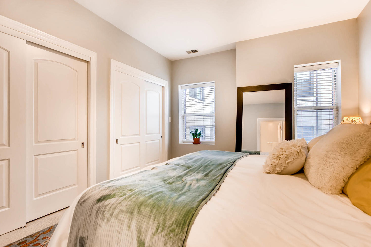 1242 West Pratt Boulevard, Unit 3F Chicago, IL 60626 - Photo 16 of 30 a bedroom with a bed and a window