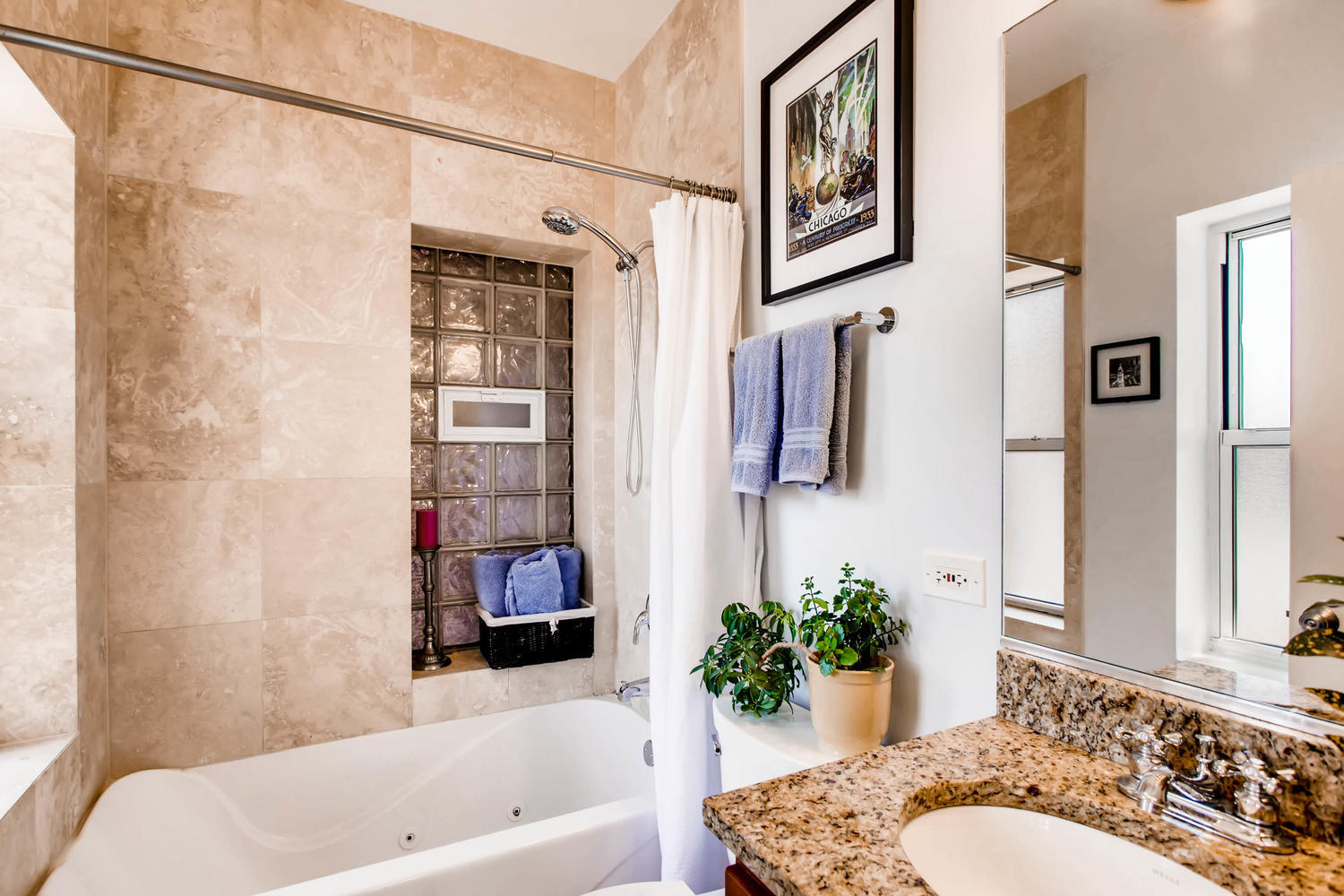 1242 West Pratt Boulevard, Unit 3F Chicago, IL 60626 - Photo 20 of 30 a bathroom with a tub shower and sink