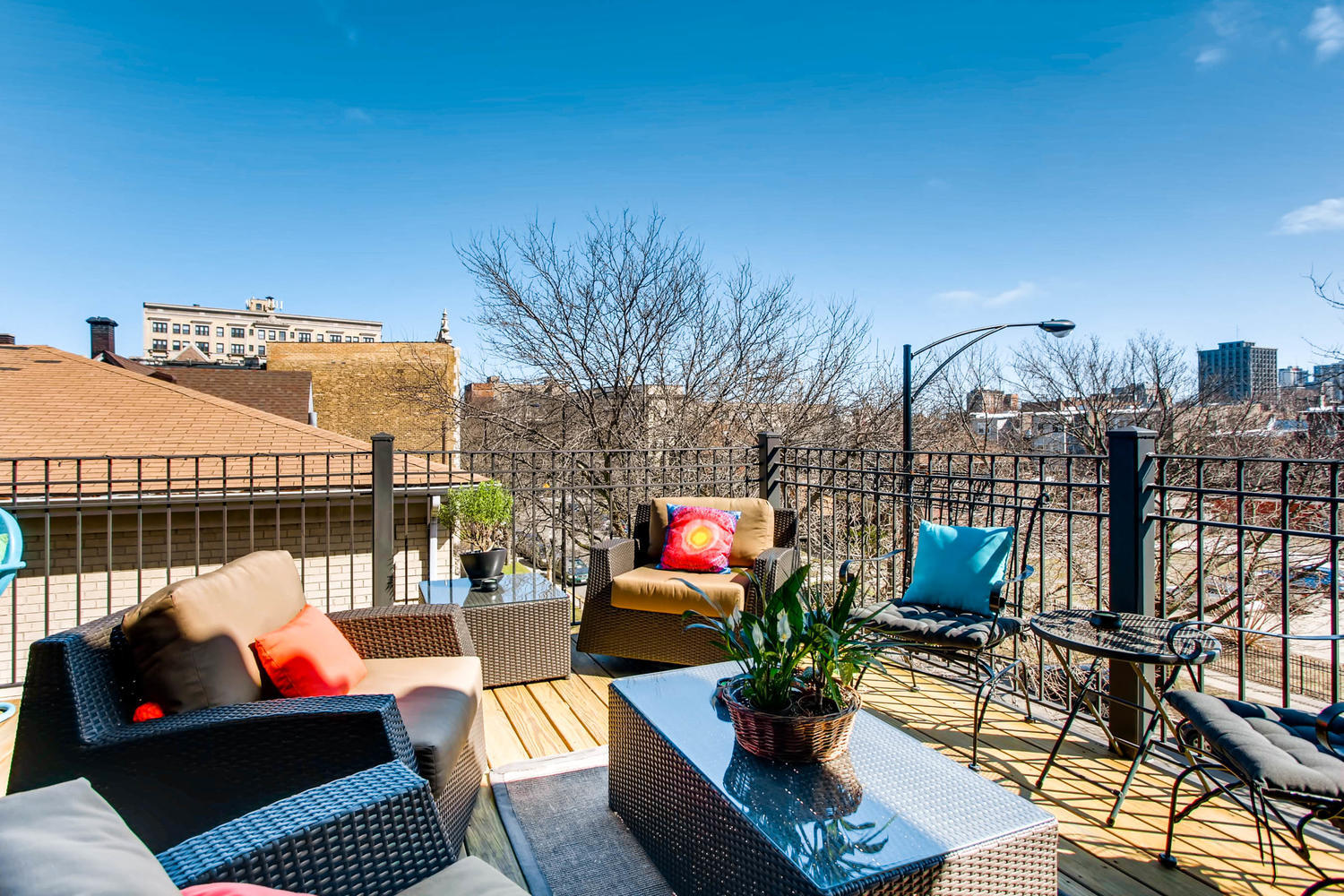 1242 West Pratt Boulevard, Unit 3F Chicago, IL 60626 - Photo 24 of 30 a outdoor living space with furniture and city view