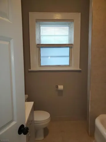 a bathroom with a toilet