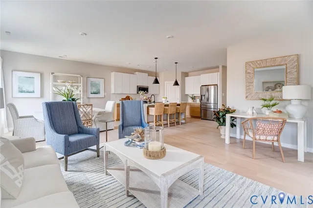 a bedroom with a bed and a chair