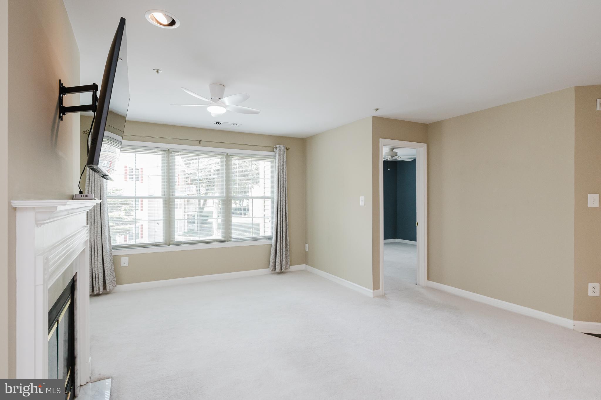 6830 H Hayley Ridge Way, Unit H Baltimore, MD 21209 - Photo 6 of 43 Into a naturally lit Living/Family Room