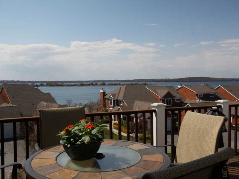 285 Village Road, Unit 285 Tiverton, RI 02878 - Photo 7 of 21 Patio/Deck. Enjoy sitting on your private deck overlooking the bay