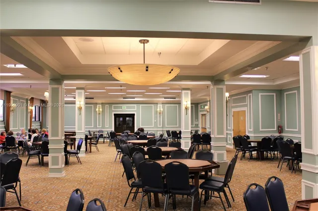 a group of people sitting in a living room