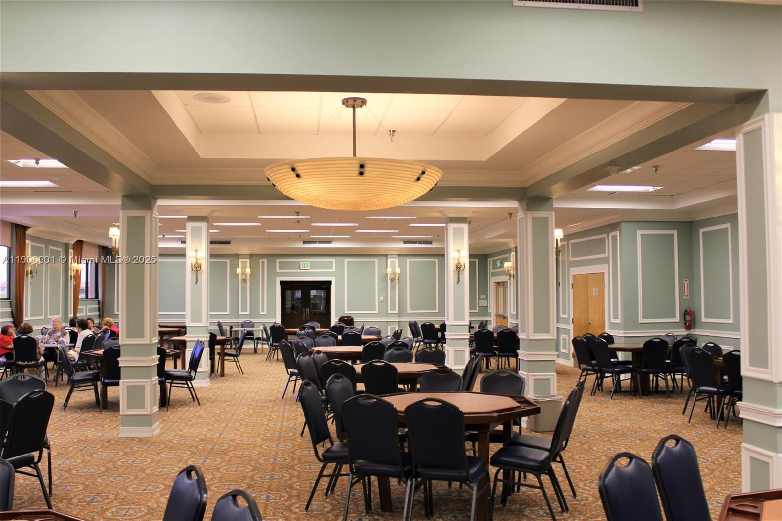 13455 Southwest 3rd Street, Unit 309S Pembroke Pines, FL 33027 - Photo 18 of 23 a group of people sitting in a living room