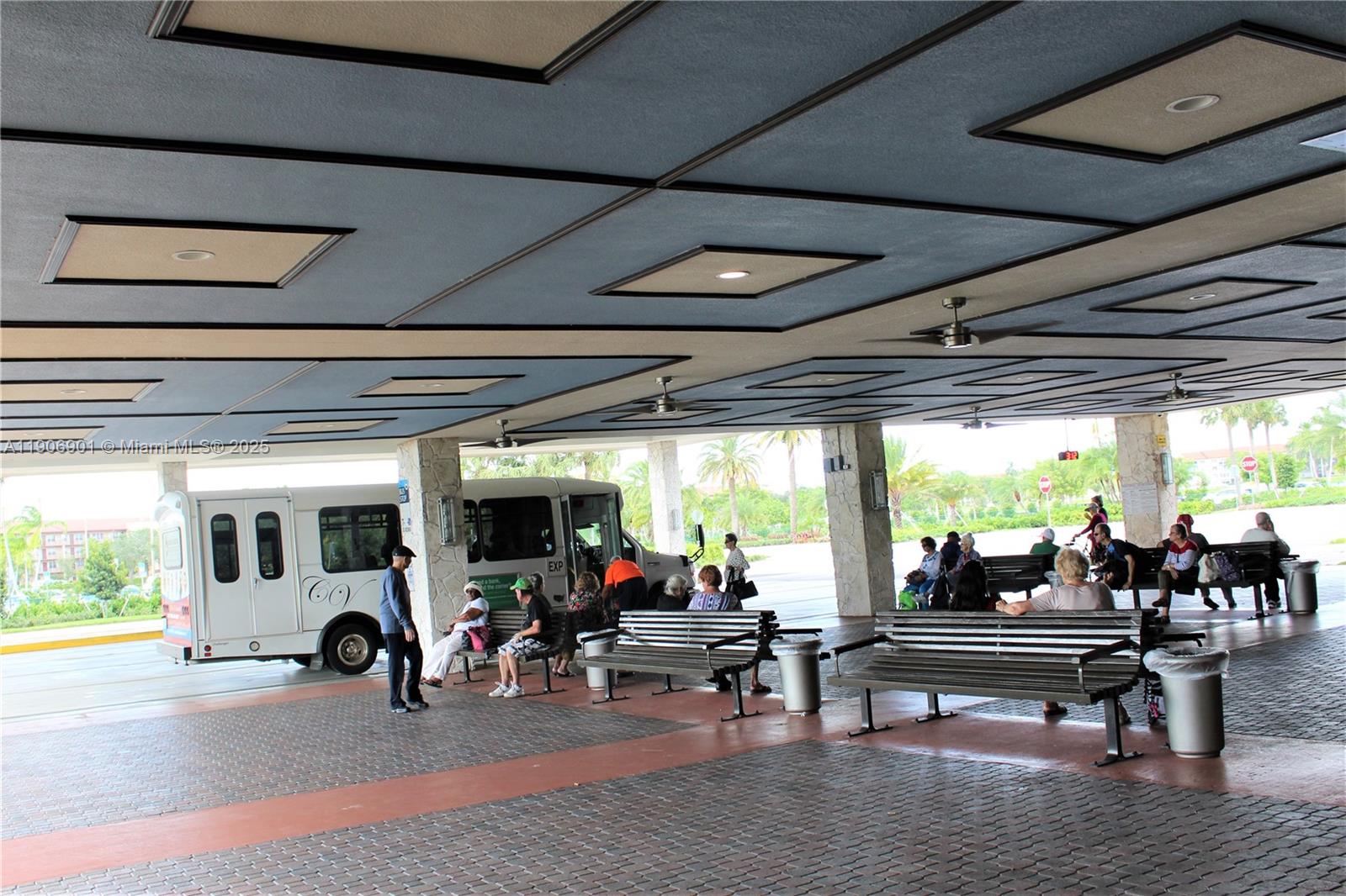 13455 Southwest 3rd Street, Unit 309S Pembroke Pines, FL 33027 - Photo 22 of 23 a living room with furniture and a window