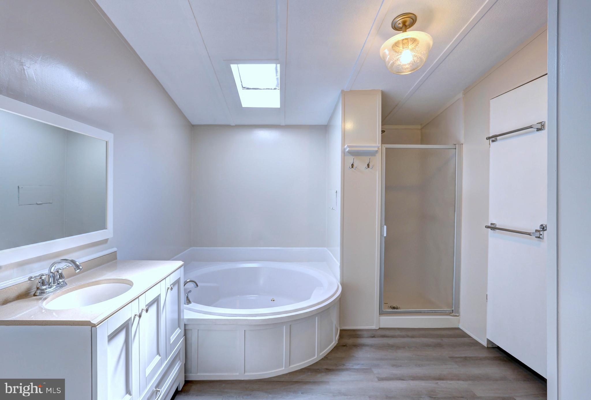 8353 Ashwood Road, Unit 8353 Jessup, MD 20794 - Photo 18 of 43 Primary Bathroom