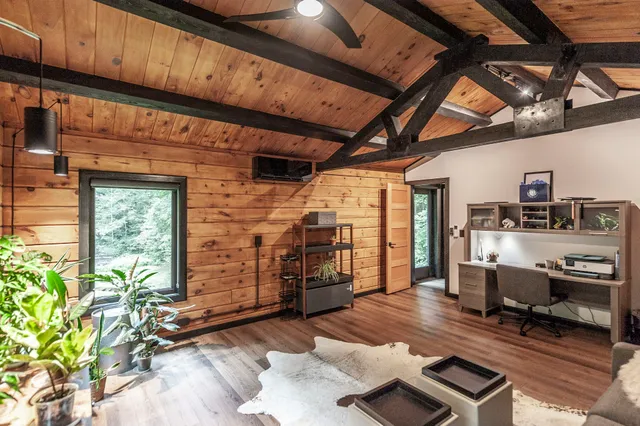 a view of a swimming pool with a yard