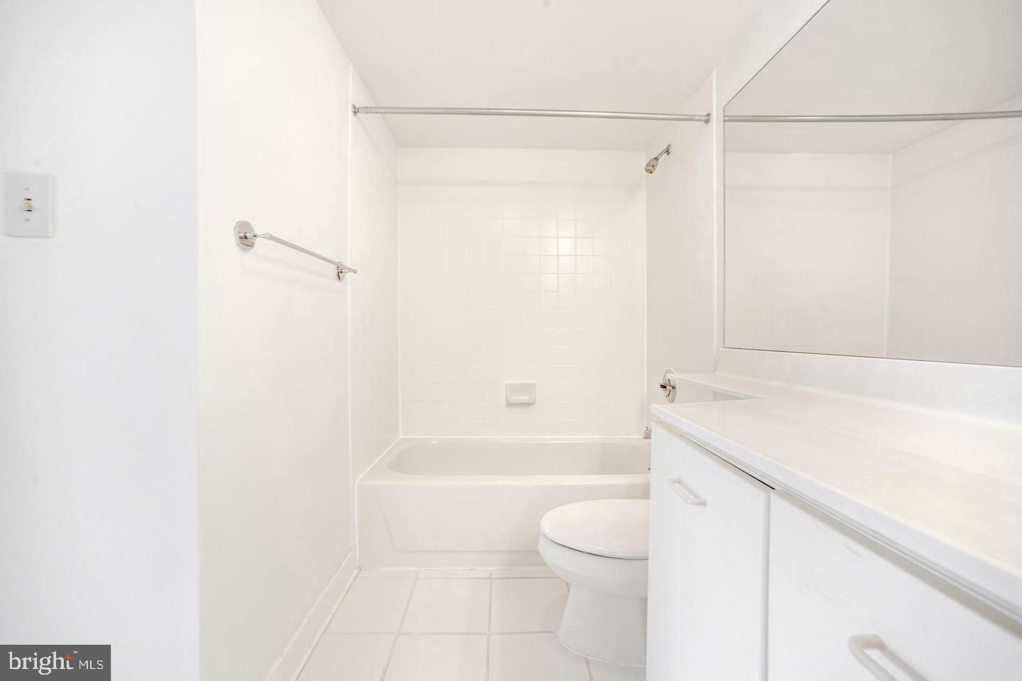 2111 Wisconsin Avenue Northwest, Unit 317 Washington, DC 20007 - Photo 20 of 38 a bathroom with a shower a toilet and a sink