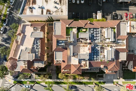 an aerial view of a city with lots of residential buildings