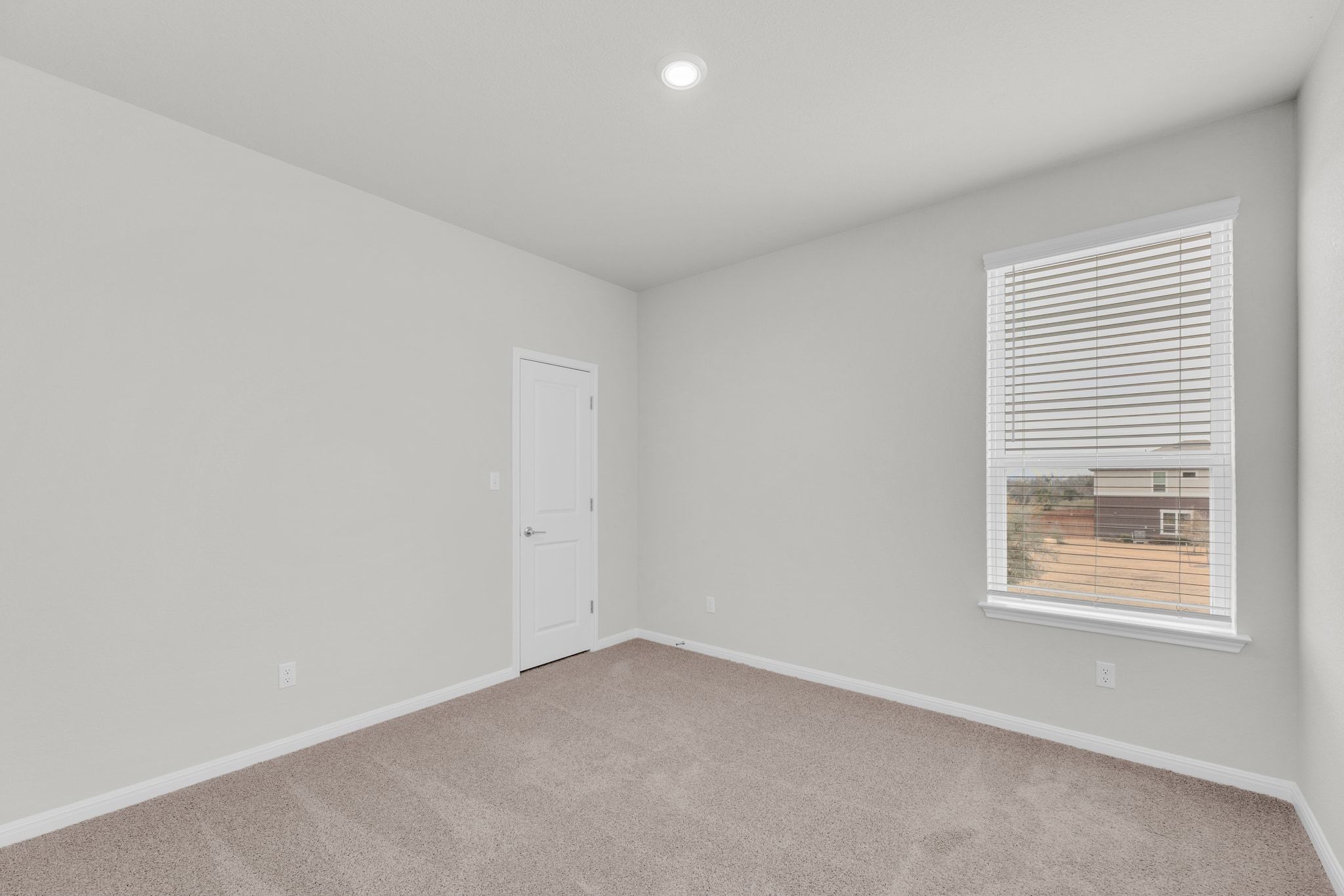 1015 Vista View Drive, Unit 101 Georgetown, TX 78626 - Photo 25 of 40 Spare room featuring light carpet and recessed lighting