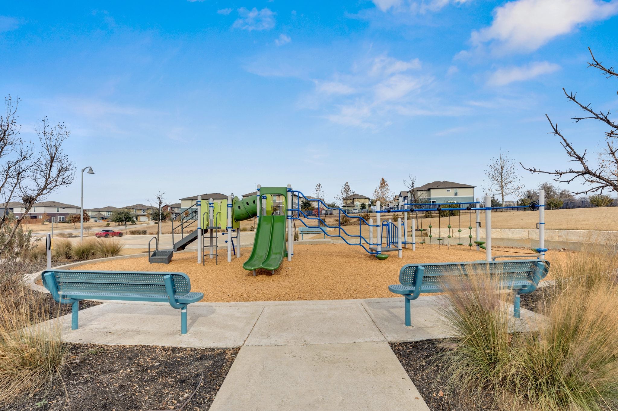 1015 Vista View Drive, Unit 101 Georgetown, TX 78626 - Photo 33 of 40 Communal playground with a residential view
