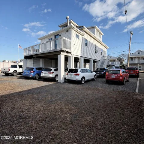 a view of a cars parked in front of a building