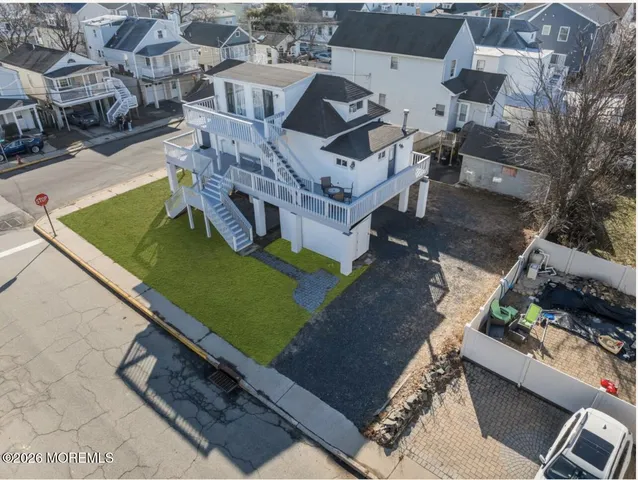 an aerial view of a house with a garden