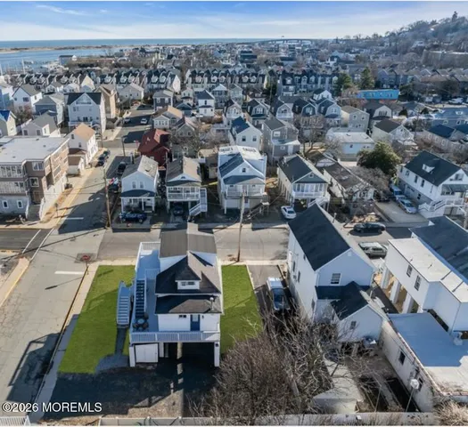 an aerial view of a house with a garden
