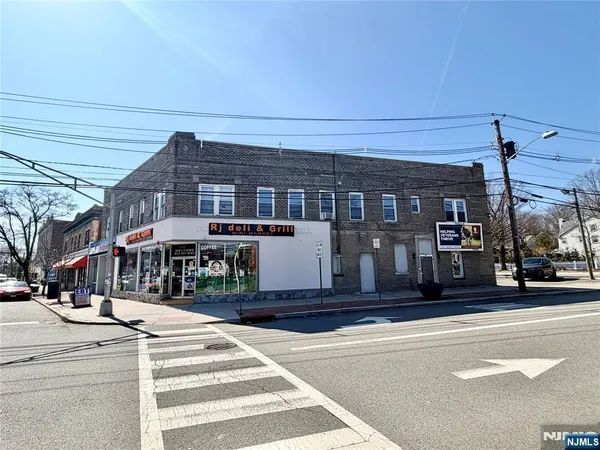 a front view of a building with street