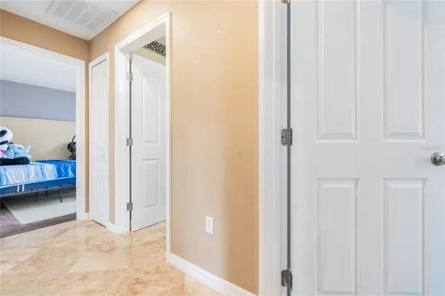 a view of bedroom and bathroom