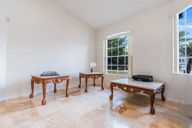 a workspace with furniture and window