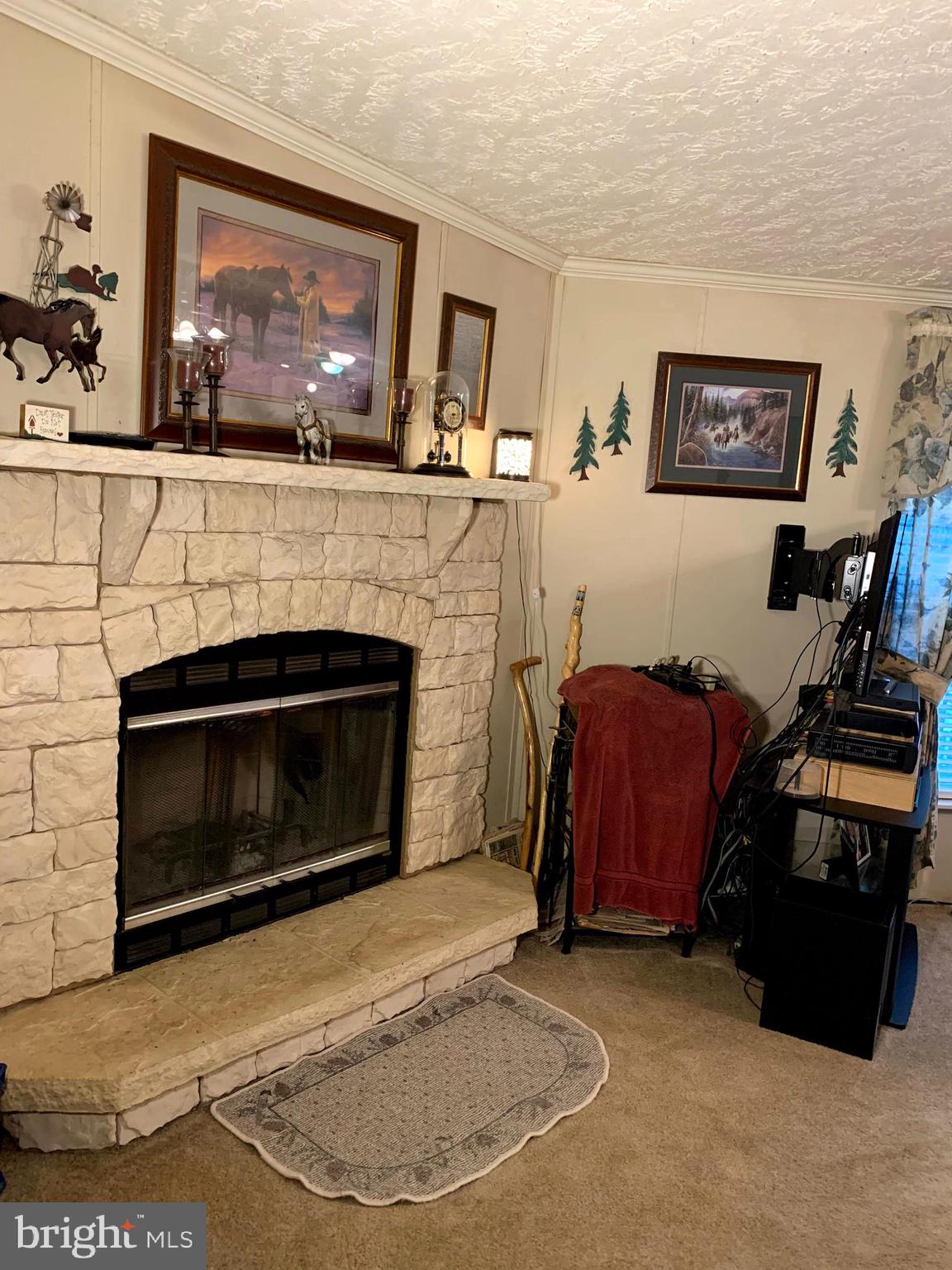 150 Barkmill Road Airville, PA 17302 - Photo 33 of 51 WOOD BURNING FIREPLACE IN FAMILY ROOM