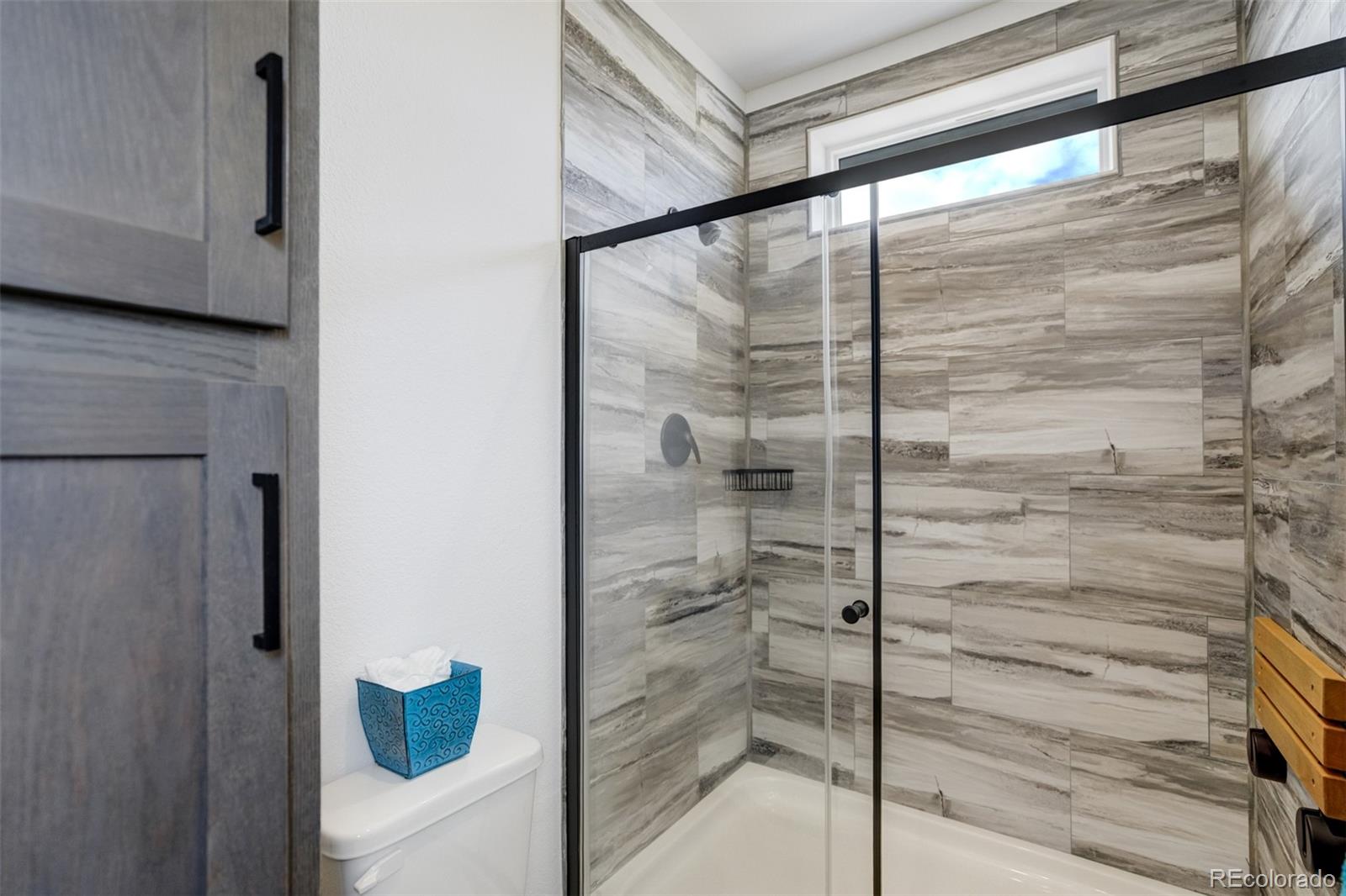 1684 9th Street Limon, CO 80828 - Photo 17 of 39 a bathroom with a shower