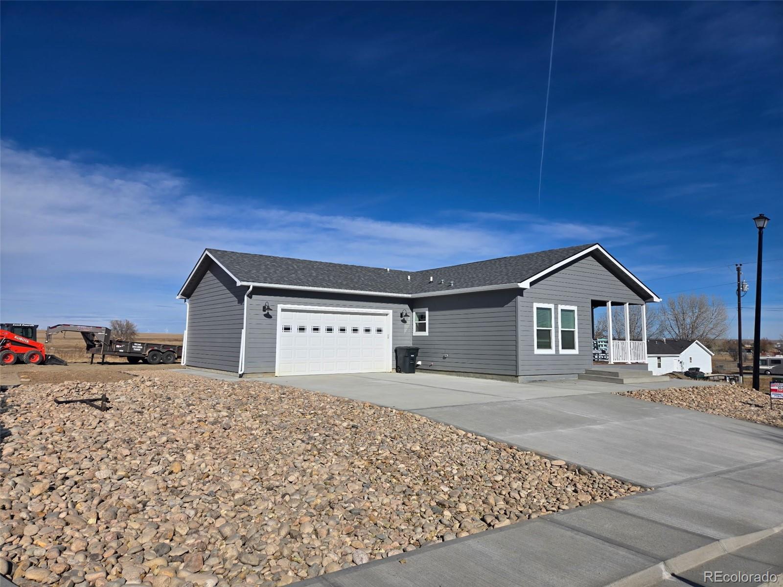 1684 9th Street Limon, CO 80828 - Photo 2 of 39 a house with a outdoor space