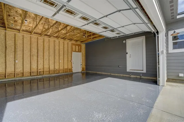 a view of a house with a garage