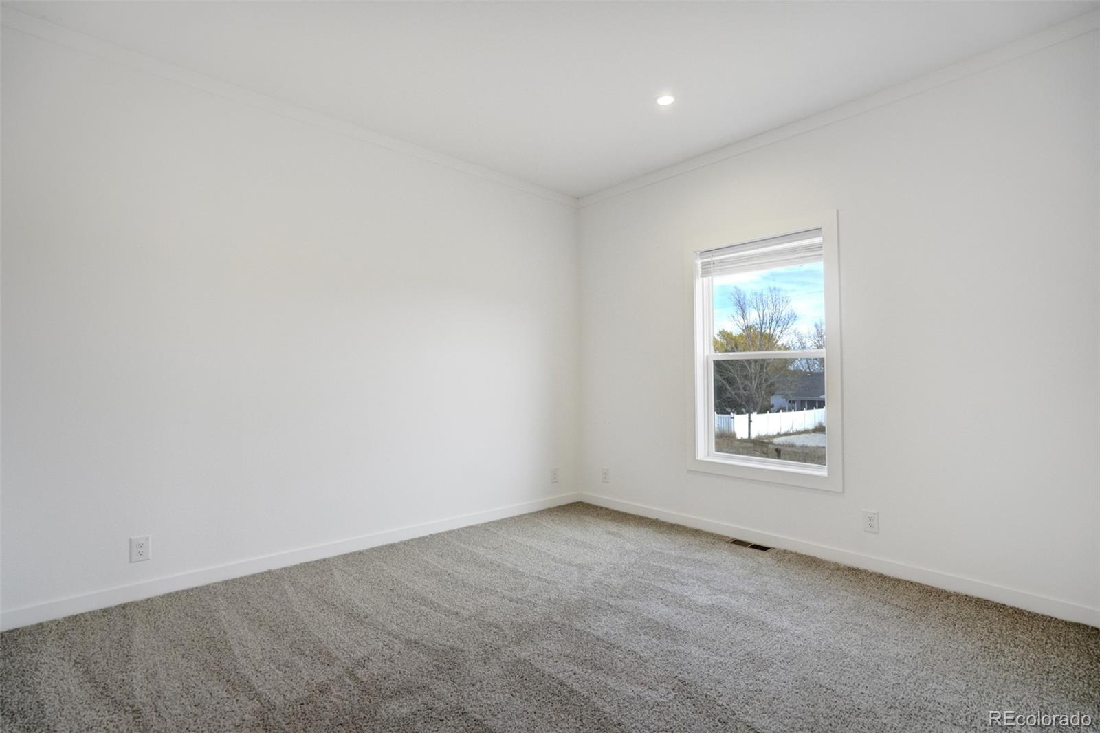 1684 9th Street Limon, CO 80828 - Photo 32 of 39 an empty room with a window