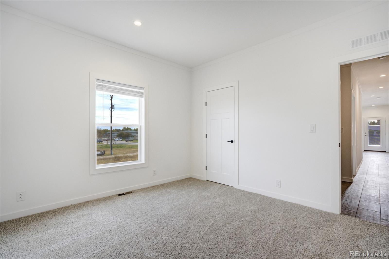1684 9th Street Limon, CO 80828 - Photo 33 of 39 an empty room with windows