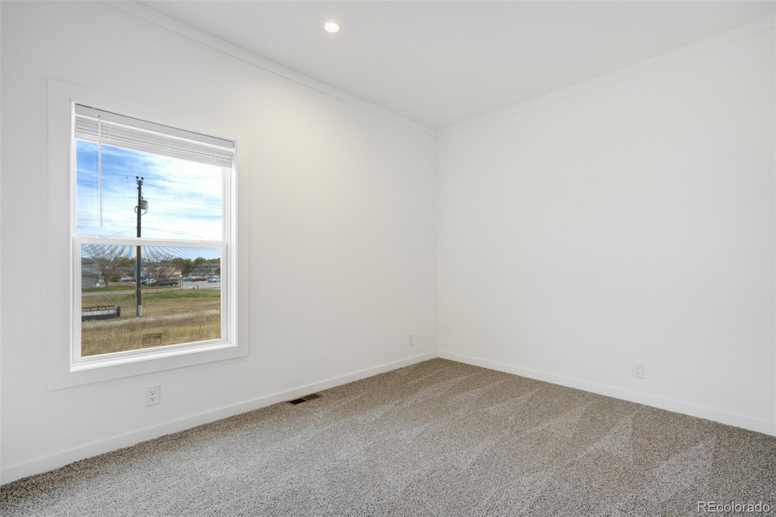 1684 9th Street Limon, CO 80828 - Photo 34 of 39 an empty room with a window