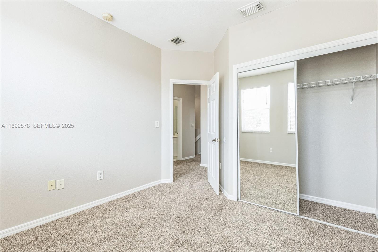 24066 Southwest 109th Court Homestead, FL 33032 - Photo 18 of 37 a view of an empty room
