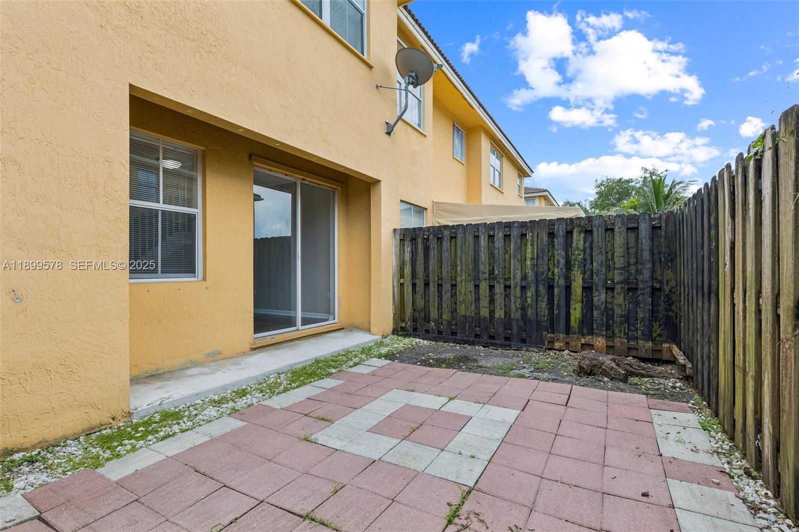 24066 Southwest 109th Court Homestead, FL 33032 - Photo 36 of 37 a view of a house with a backyard