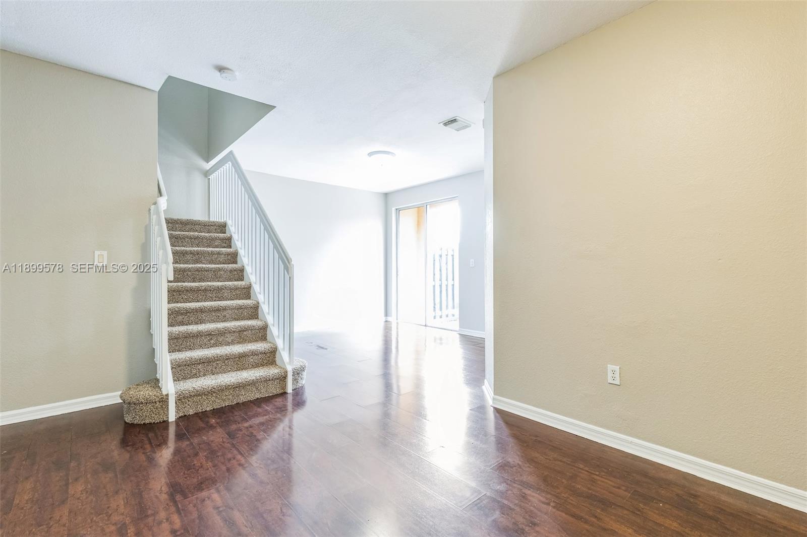 24066 Southwest 109th Court Homestead, FL 33032 - Photo 4 of 37 a view of entryway with wooden floor
