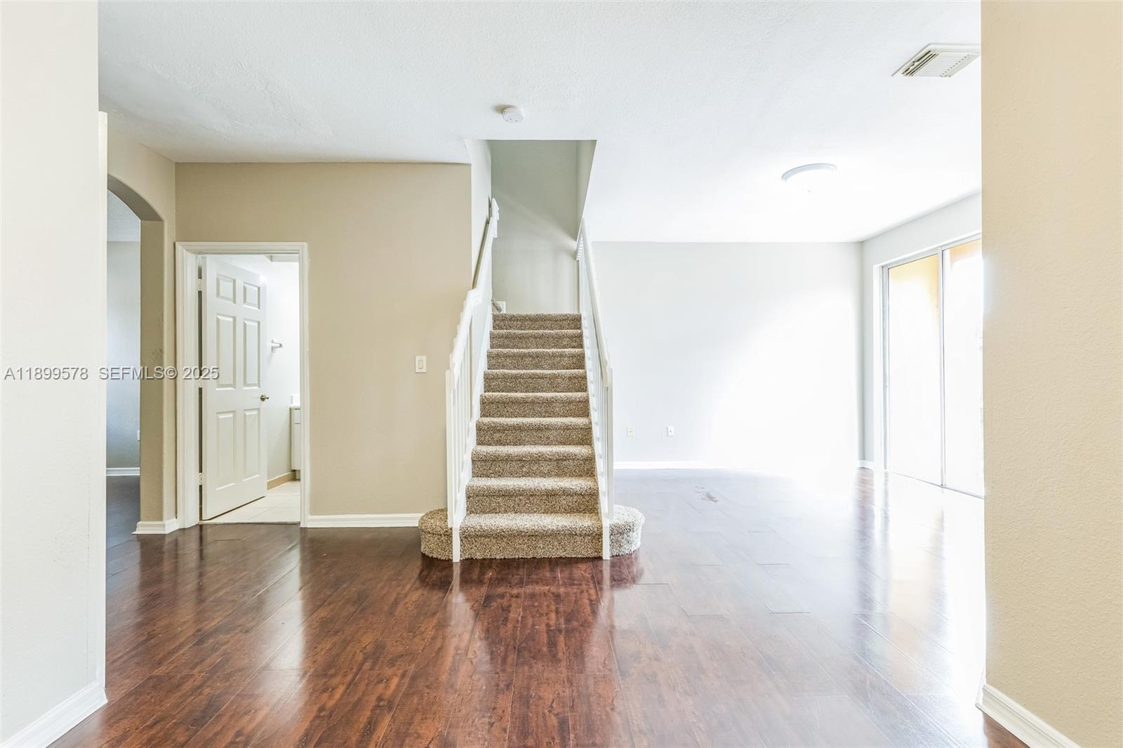 24066 Southwest 109th Court Homestead, FL 33032 - Photo 5 of 37 a view of entryway with wooden floor