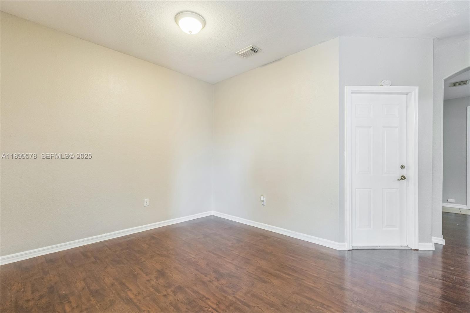 24066 Southwest 109th Court Homestead, FL 33032 - Photo 7 of 37 a view of an empty room