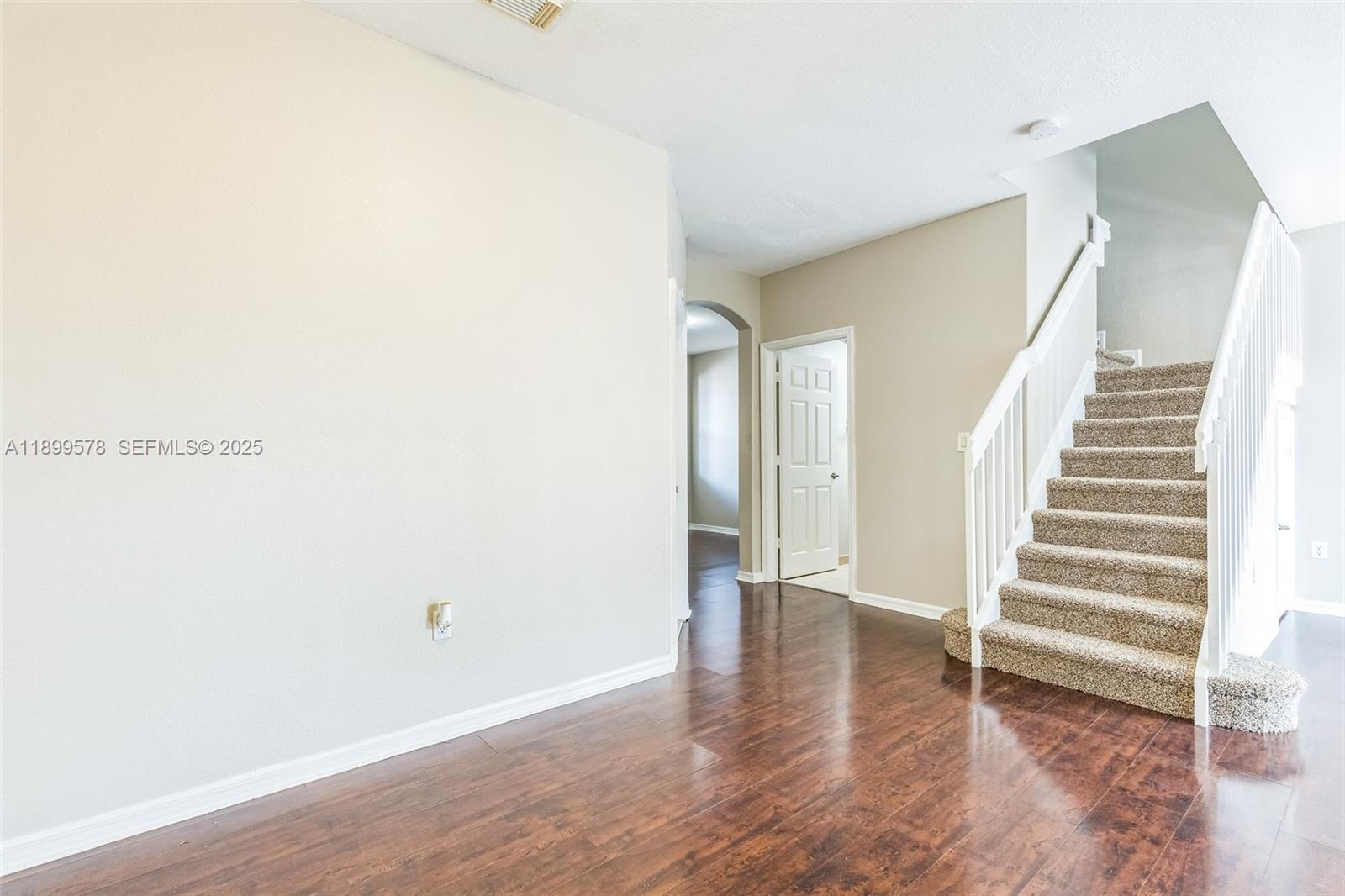 24066 Southwest 109th Court Homestead, FL 33032 - Photo 8 of 37 a view of entryway with wooden floor