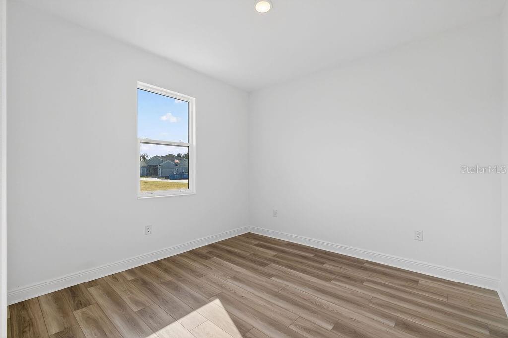 3951 Kennebunk Loop Mount Dora, FL 32757 - Photo 24 of 51 an empty room with a window