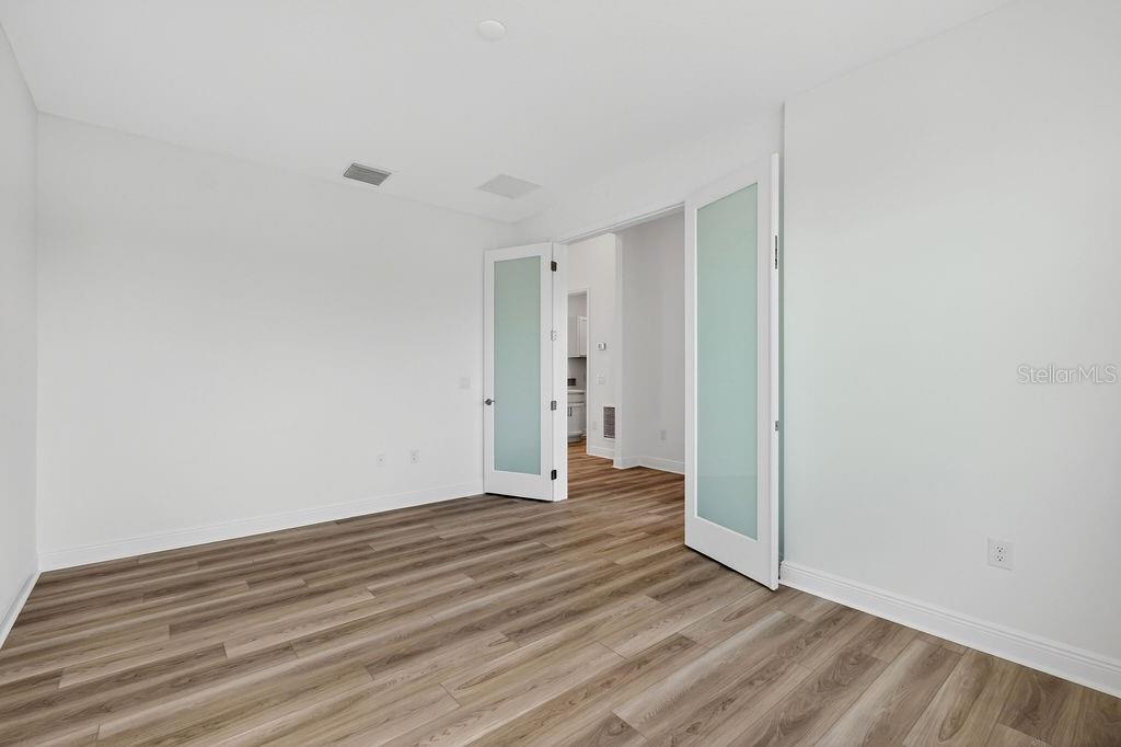 3951 Kennebunk Loop Mount Dora, FL 32757 - Photo 29 of 51 a view of a room with wooden floor
