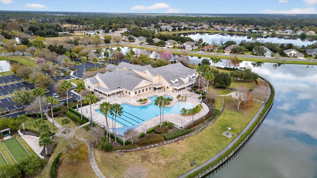 3951 Kennebunk Loop Mount Dora, FL 32757 - Photo 40 of 51 an aerial view of a house with a yard