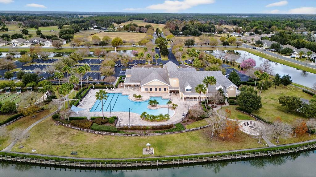 3951 Kennebunk Loop Mount Dora, FL 32757 - Photo 41 of 51 an aerial view of residential houses with outdoor space