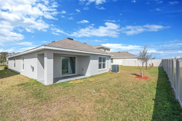 a front view of house with an outdoor space