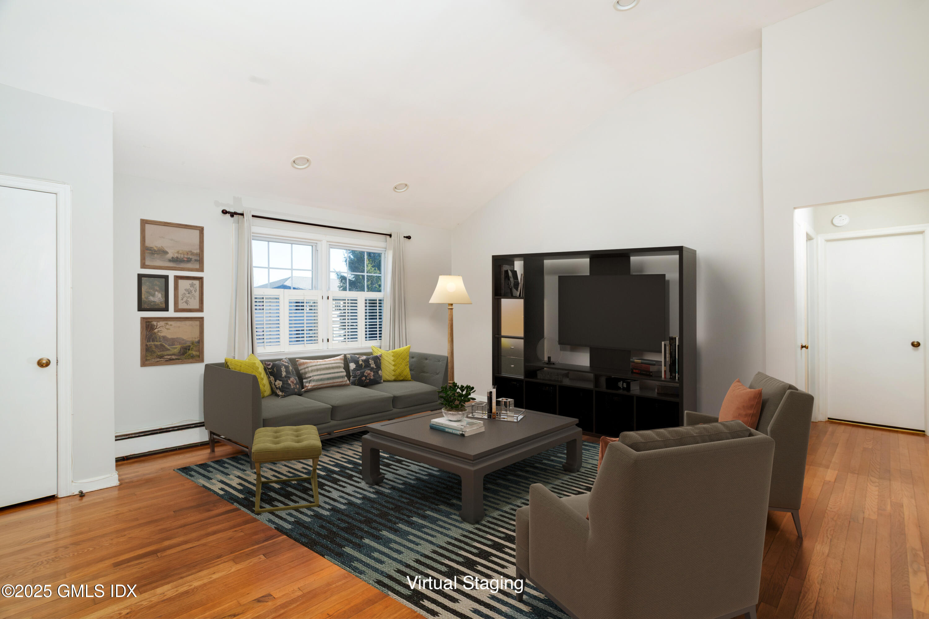 47 Valley Road, Unit B3 Cos Cob, CT 06807 - Photo 6 of 17 a living room with furniture and a flat screen tv