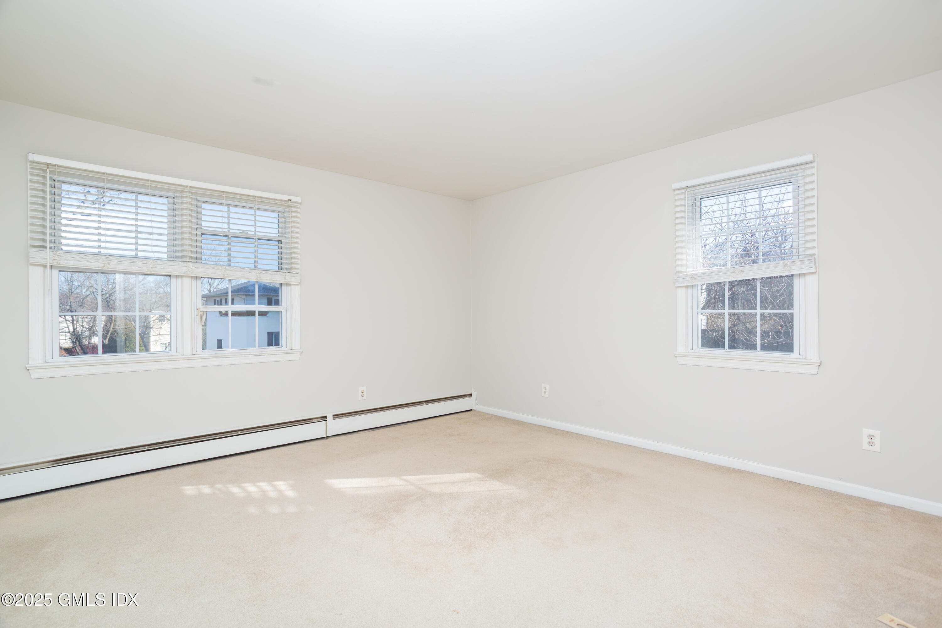 47 Valley Road, Unit B3 Cos Cob, CT 06807 - Photo 10 of 17 an empty room with a window
